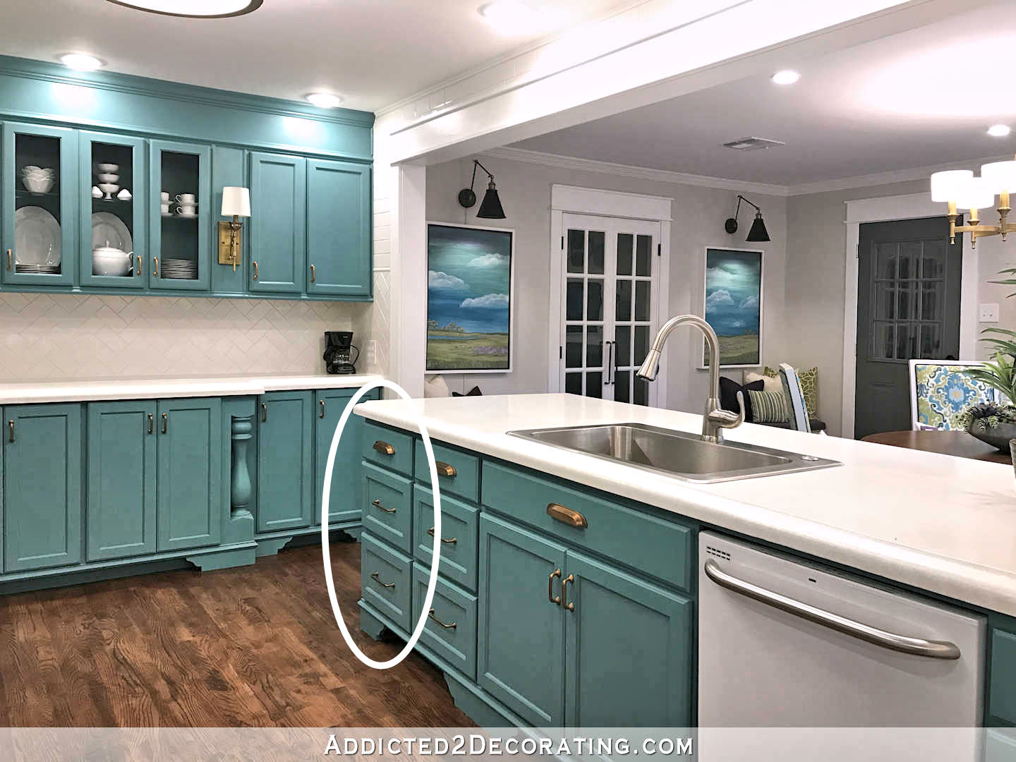 teal kitchen - plan to turn three drawer cabinet into pull out garbage cans