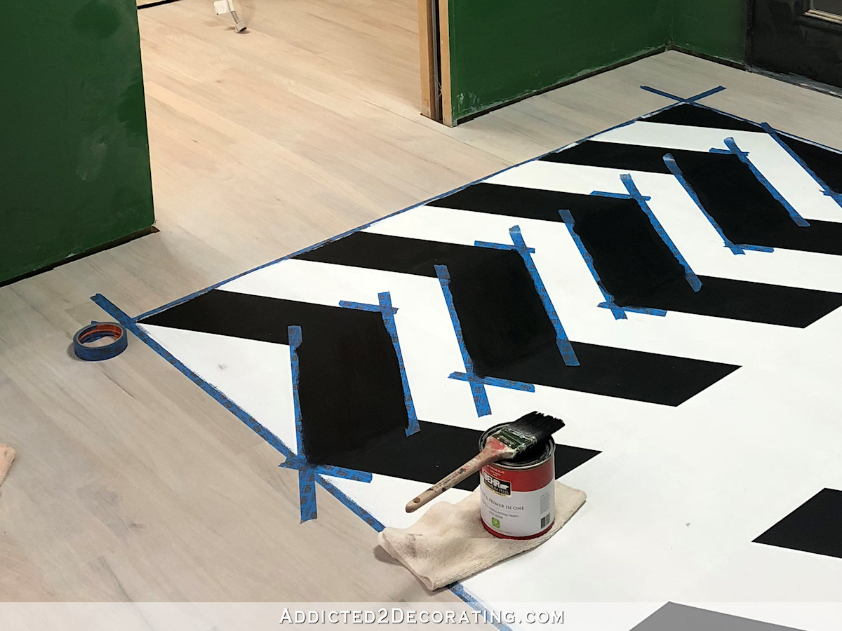 painted black and white chevron floor design - 10