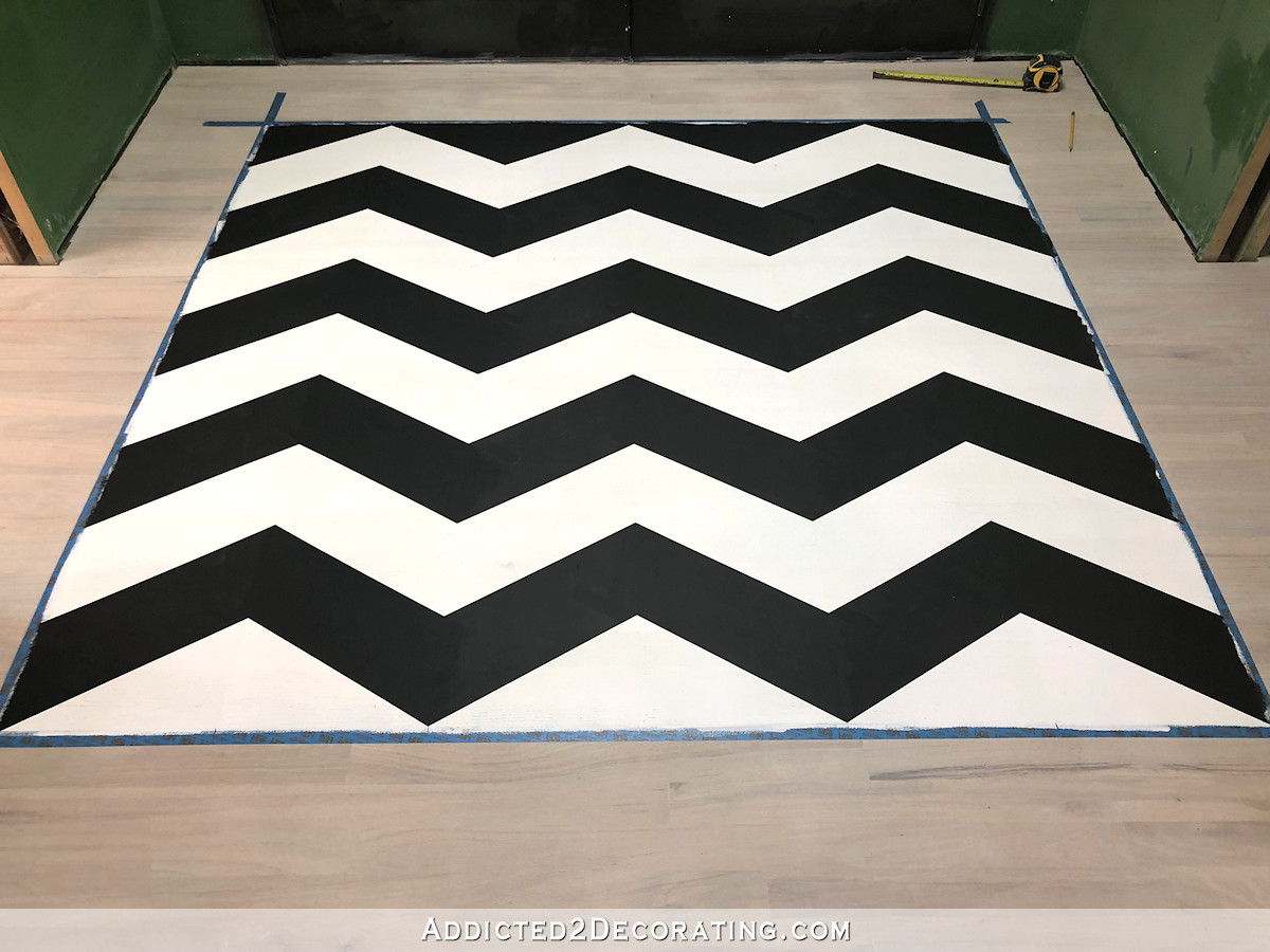 painted black and white chevron floor design - 11