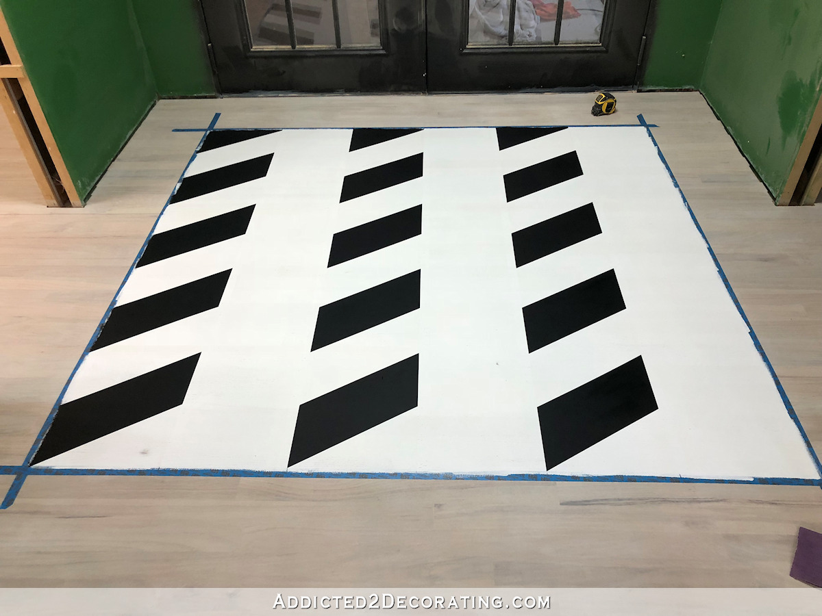painted black and white chevron floor design - 9