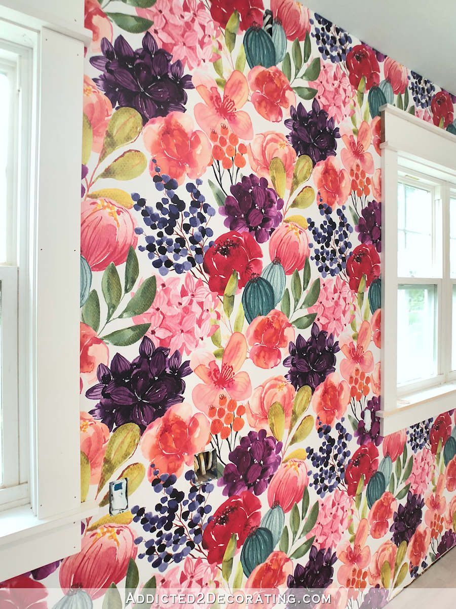 Bright and bold watercolor floral wallpaper from Spoonflower on main wall of studio - closeup
