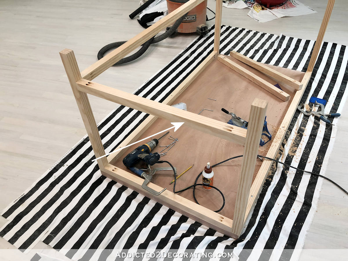 DIY writing desk - attach side stretcher bars with wood glue and pocket hole screws.