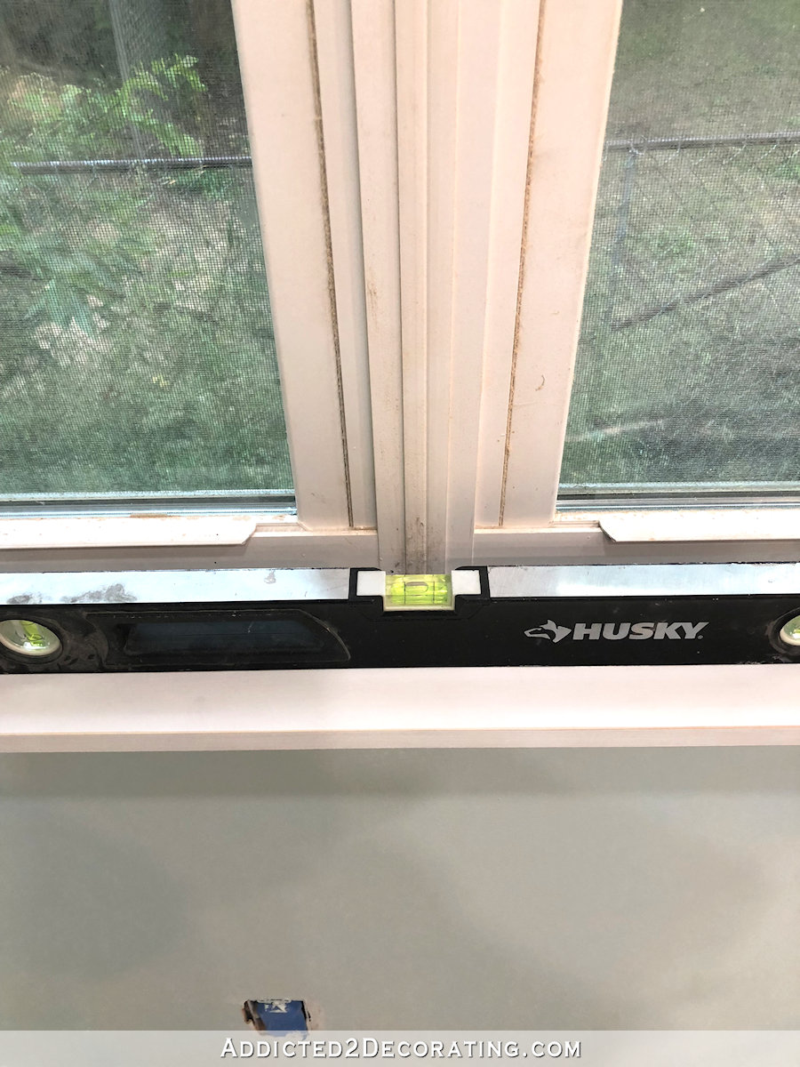 DIY window casings - use bubble level on window sill