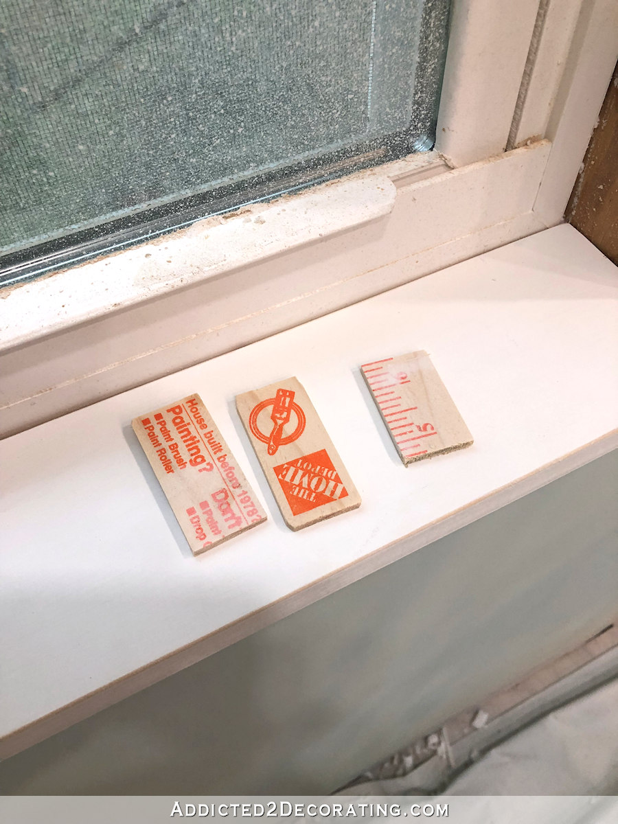 DIY window trim - use shims to level window sill