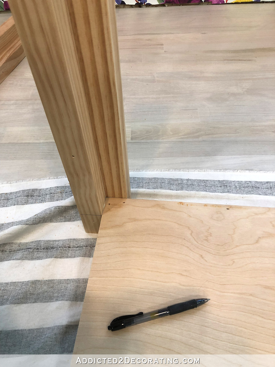 how to build a big craft table - 10 - attach legs with nails