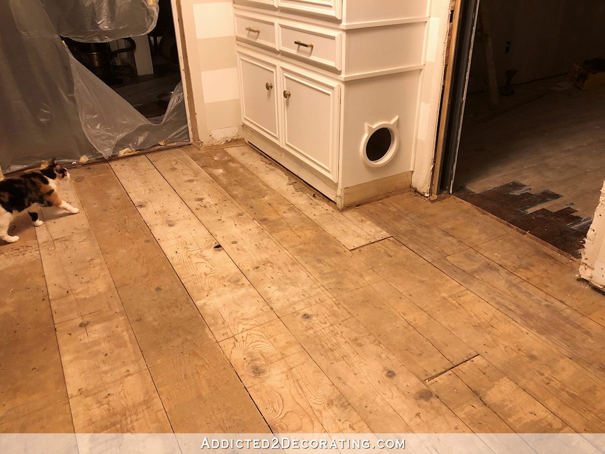 hallway with hardwood floor removed 3
