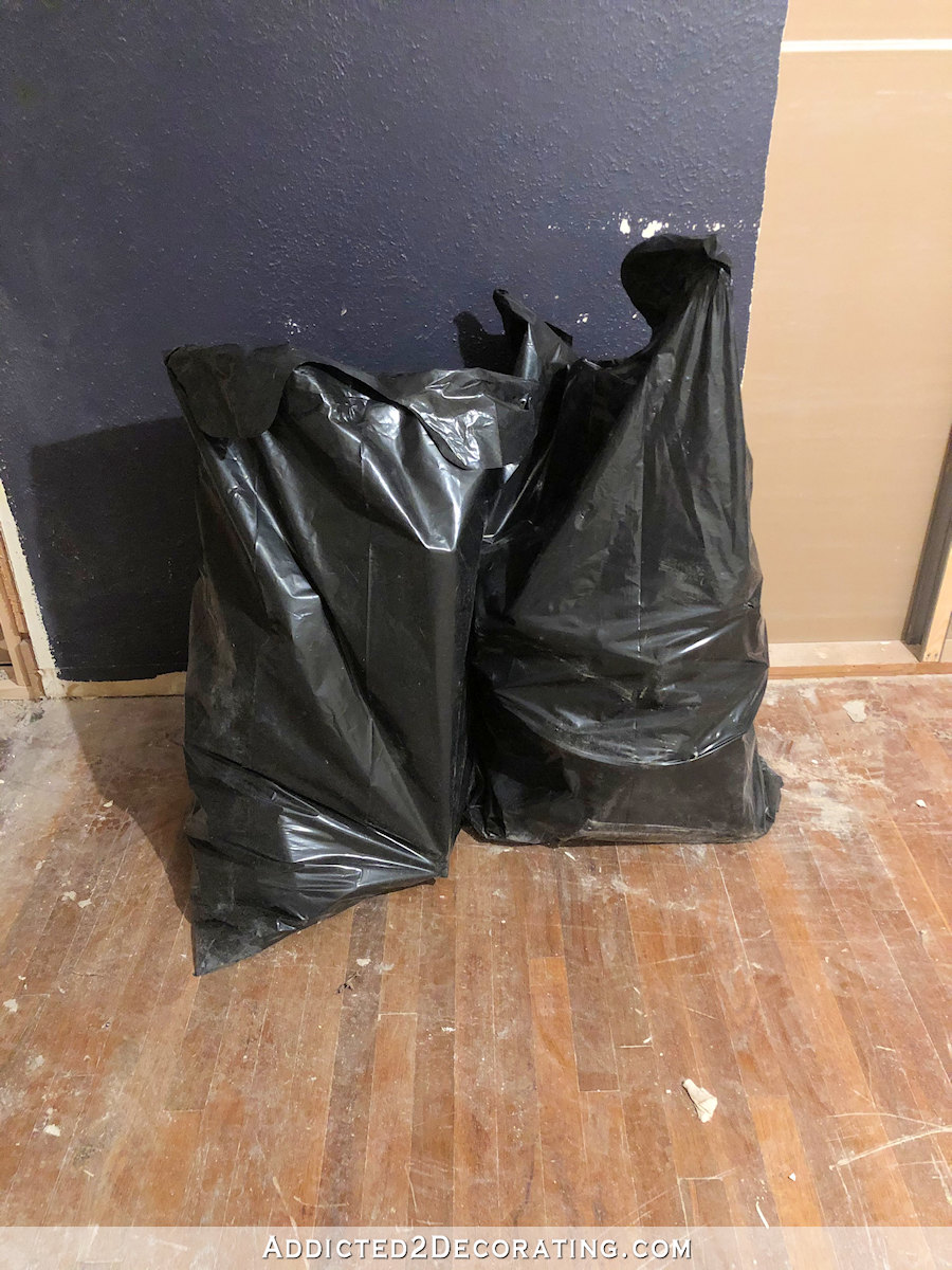 master bathroom - two contractor bags
