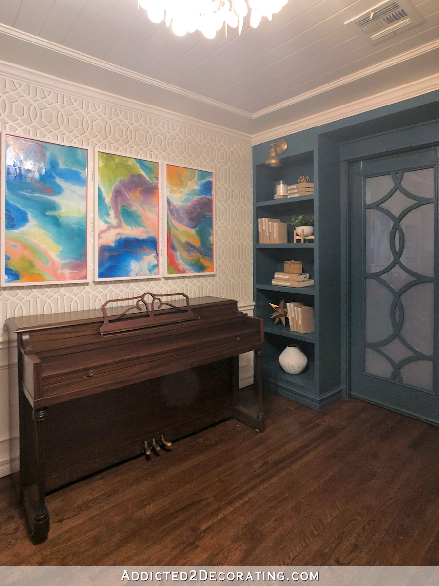 music room with teal bookcases - 4