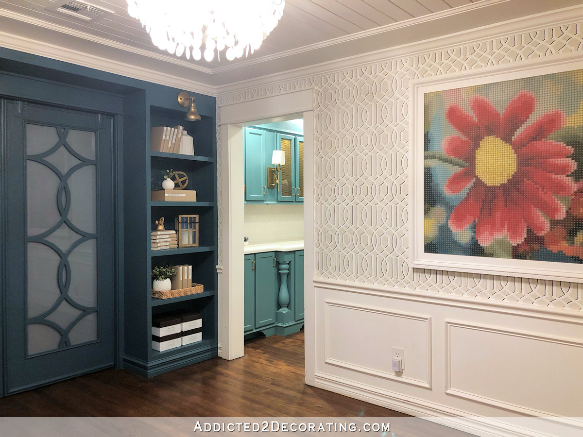 music room with teal bookcases - 7