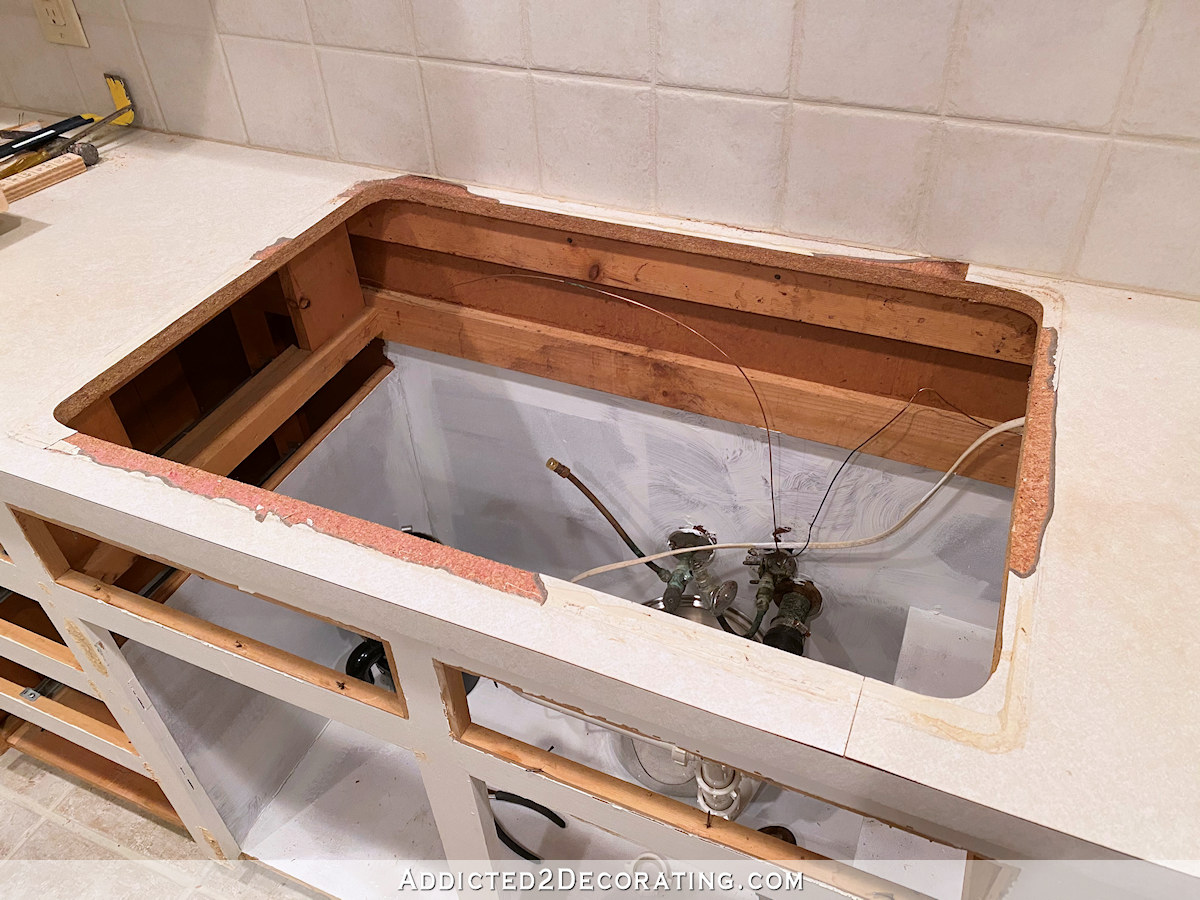 broken laminate around sink