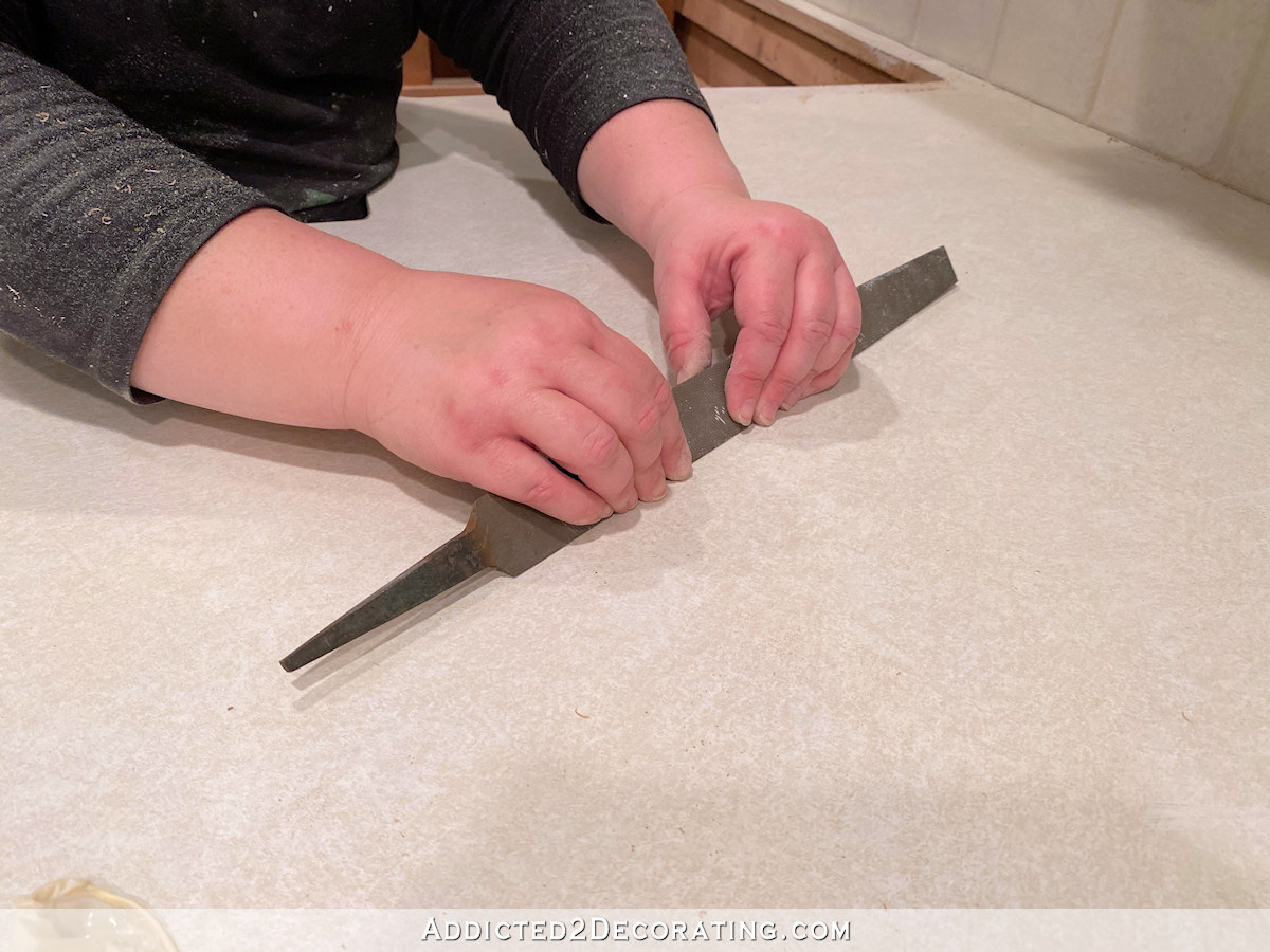 diy countertop - installing new laiminate over old - scratch surface with metal file
