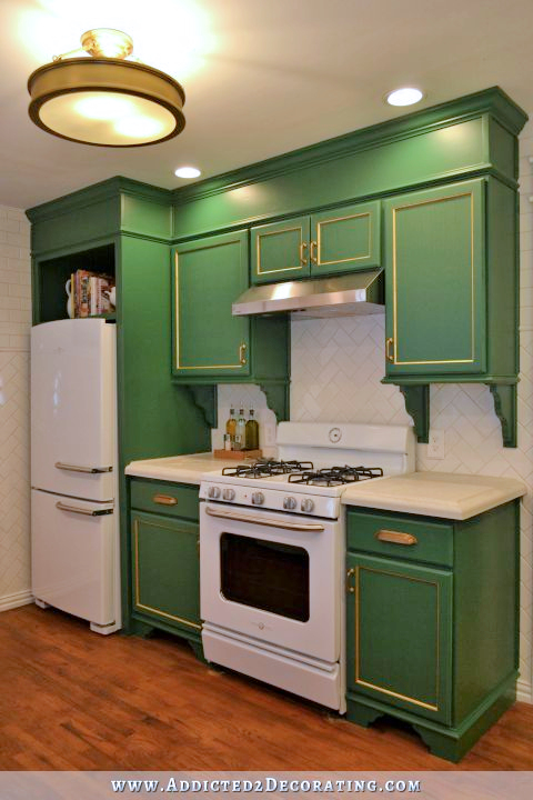 green kitchen - refrigerator and stove wall
