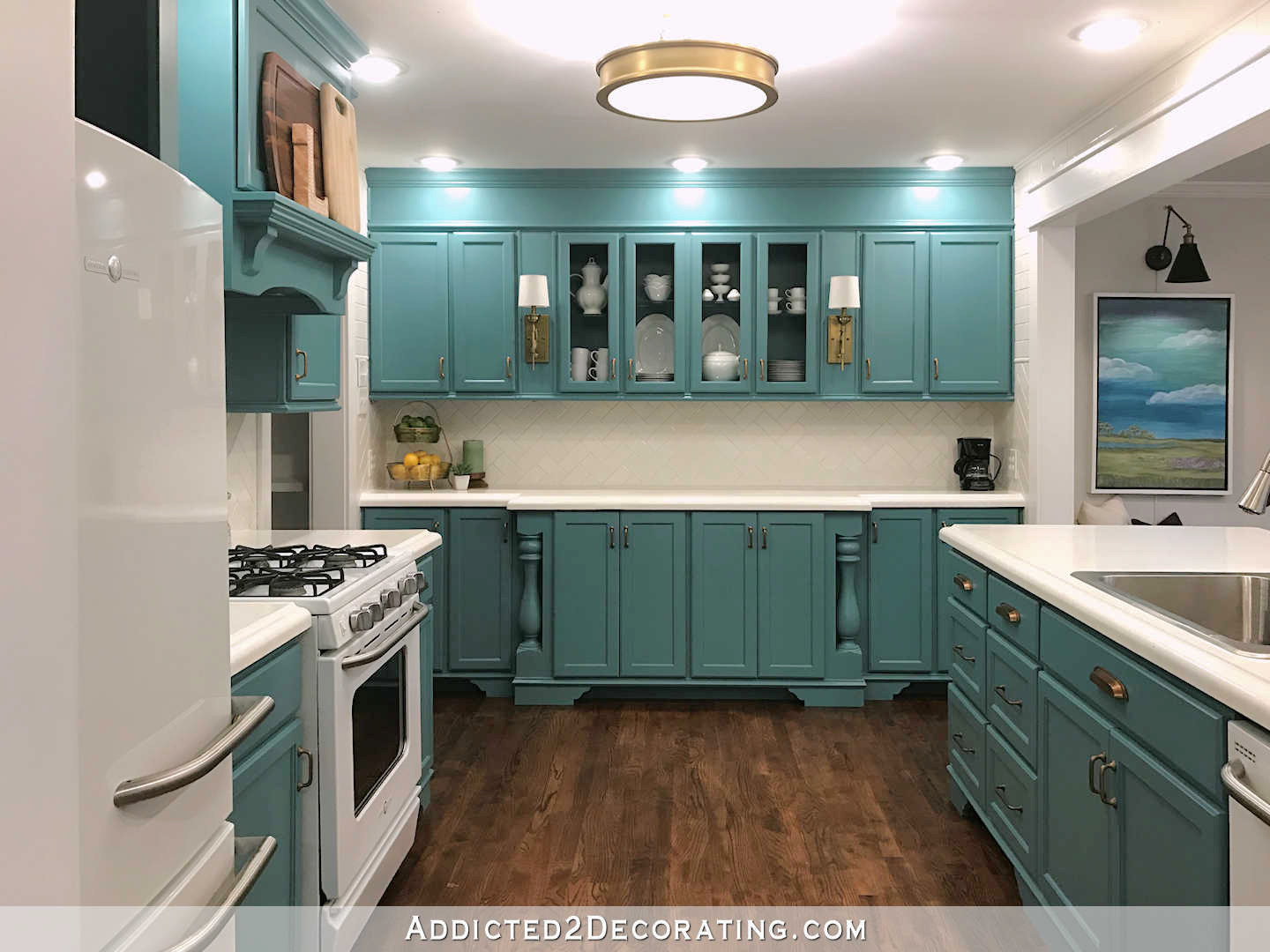 teal kitchen wall of cabinets
