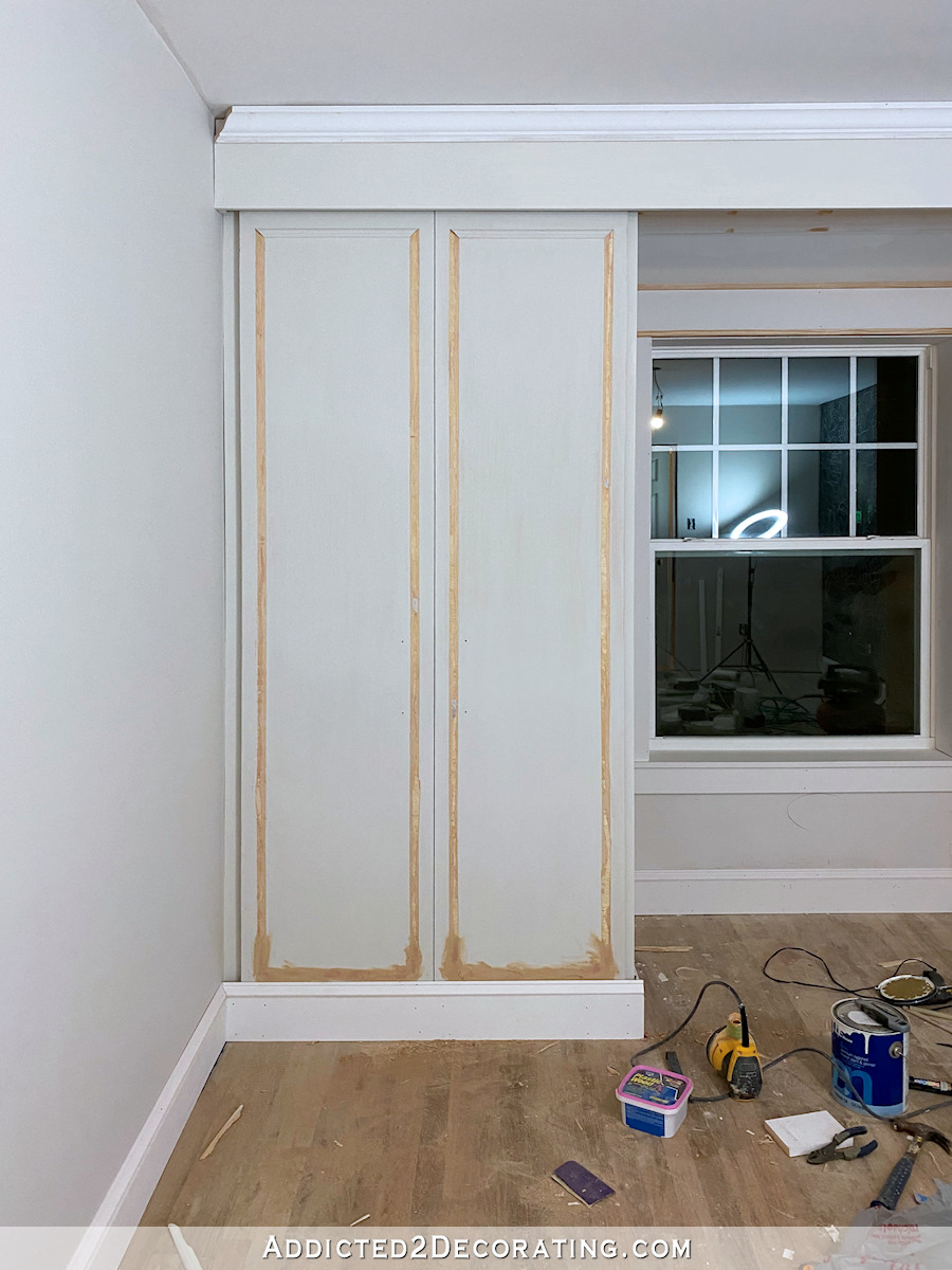 finishing the trim on the built-in closets - 6