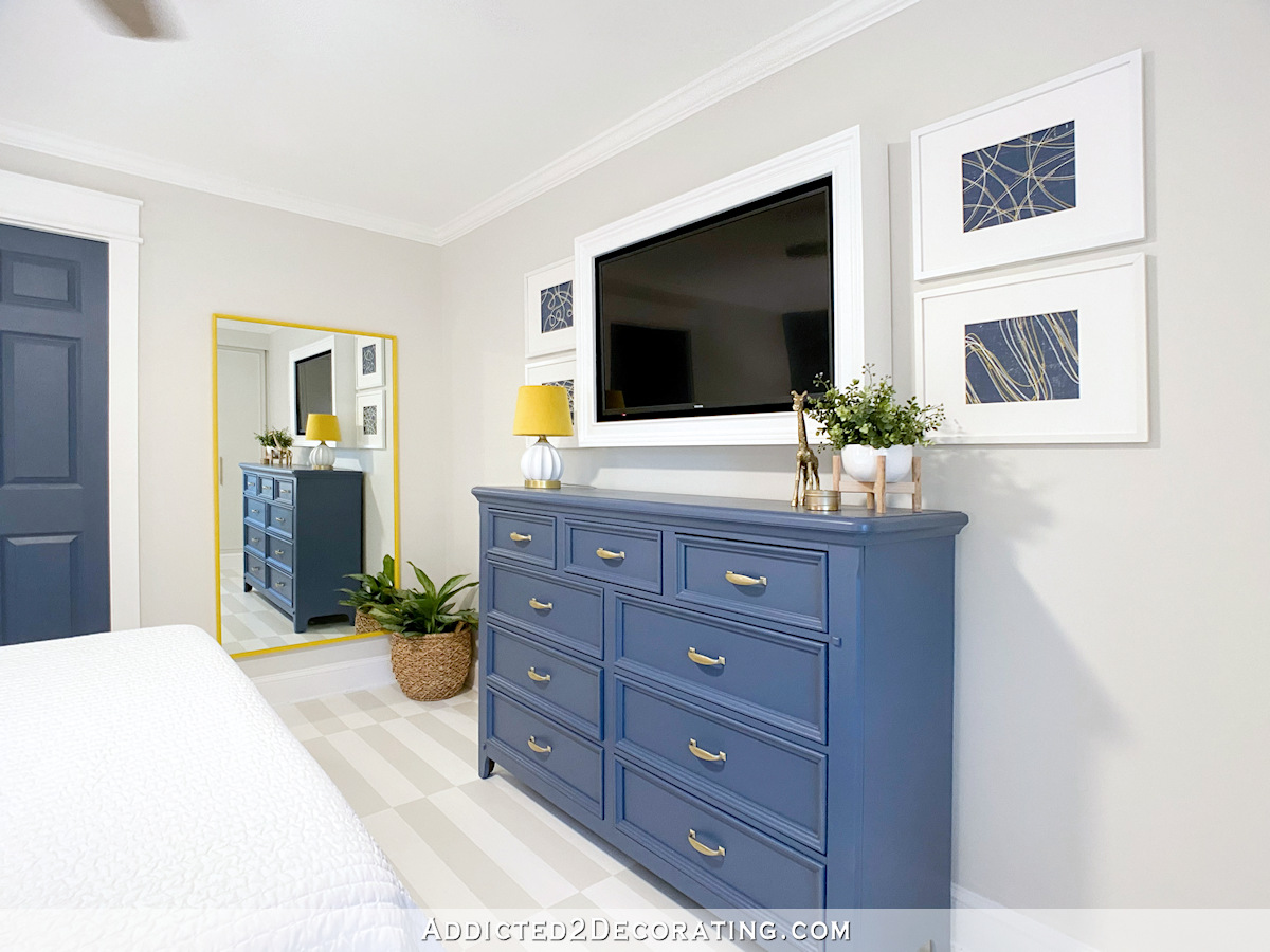 blue painted dresser in guest bedroom, primed with Zinsser Cover Stain oil-based primer and painted with Behr paint, painted with a brush