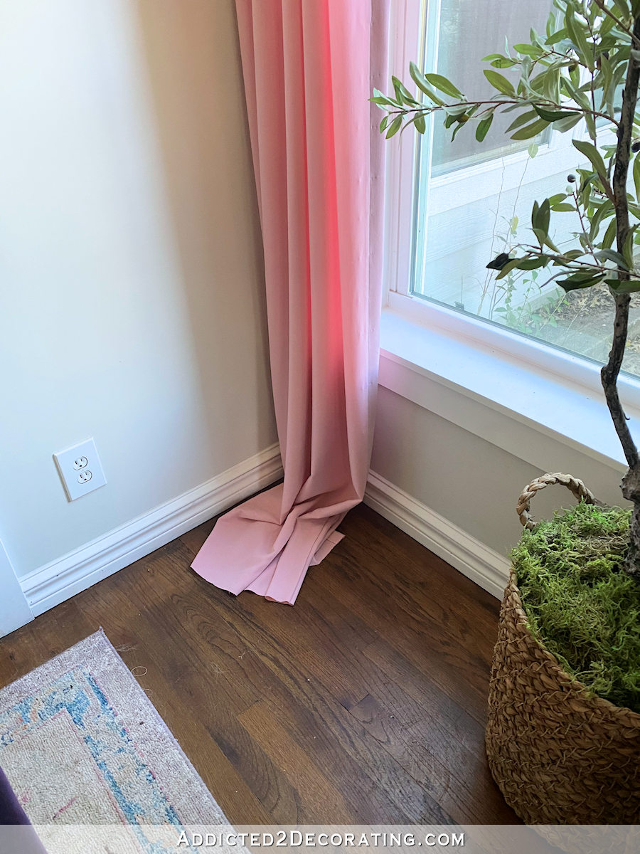 hemmed pink living room curtains - before