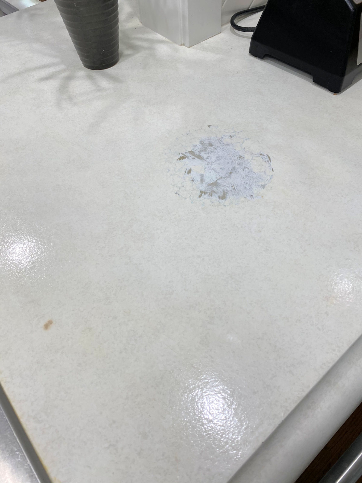 kitchen - concrete countertops - finish eaten away by isopropyl alcohol