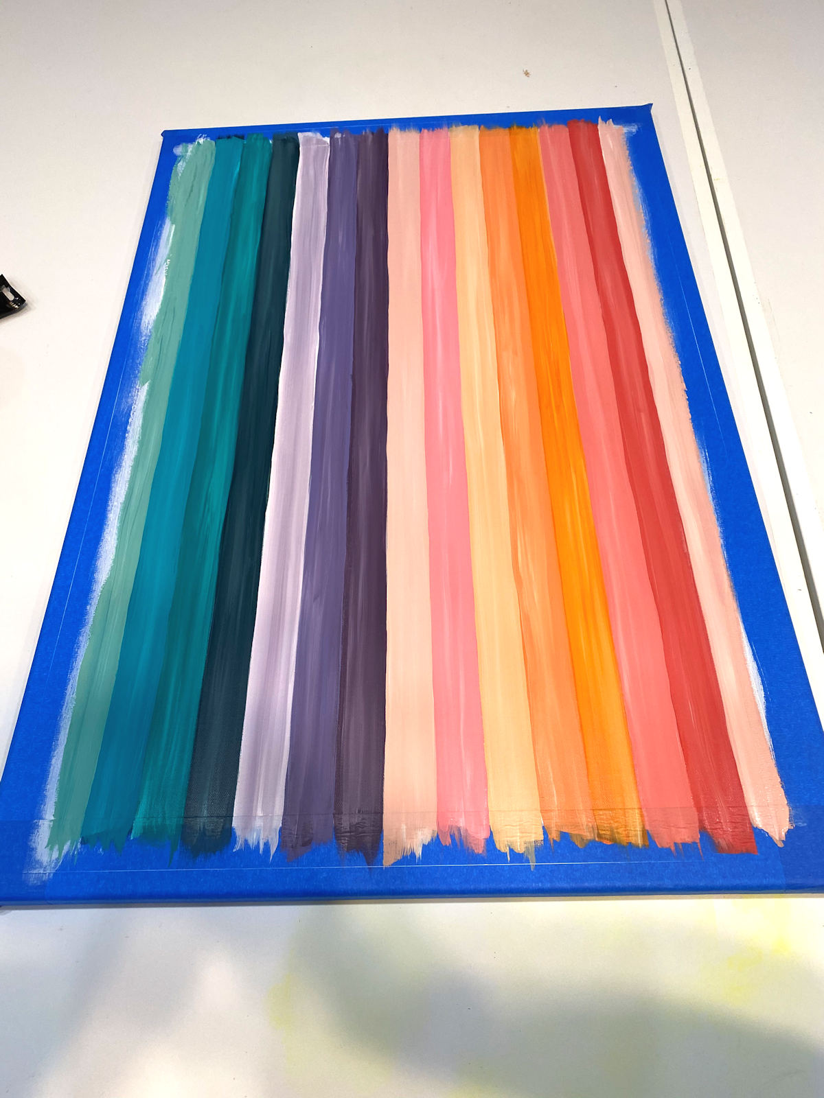 DIY colorful cut glass glitter artwork - step 3 - tape off and paint colorful stripes