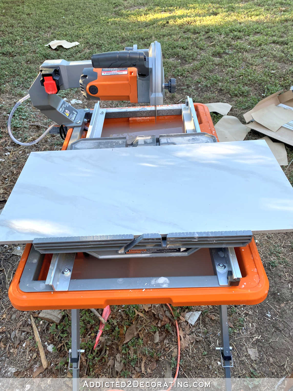 Rigid tile saw with stand and large water reservoir - 1