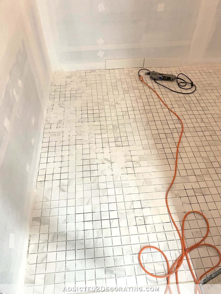 cleaning mortar in and between tiles before grouting - 4