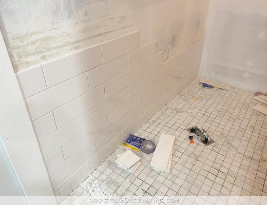 tiling the bottom of shower walls with a sloped shower floor - 6