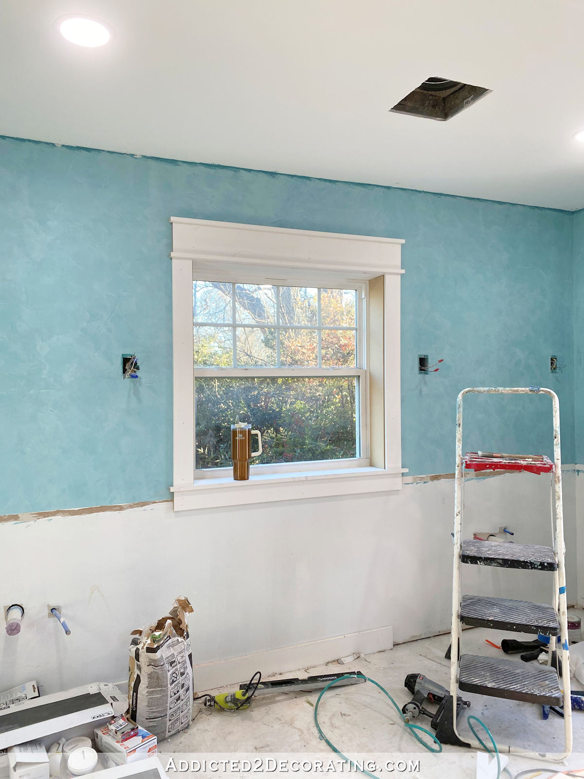 Master Bathroom Progress – Window Trimmed, Sconces Installed, Mirror Hung