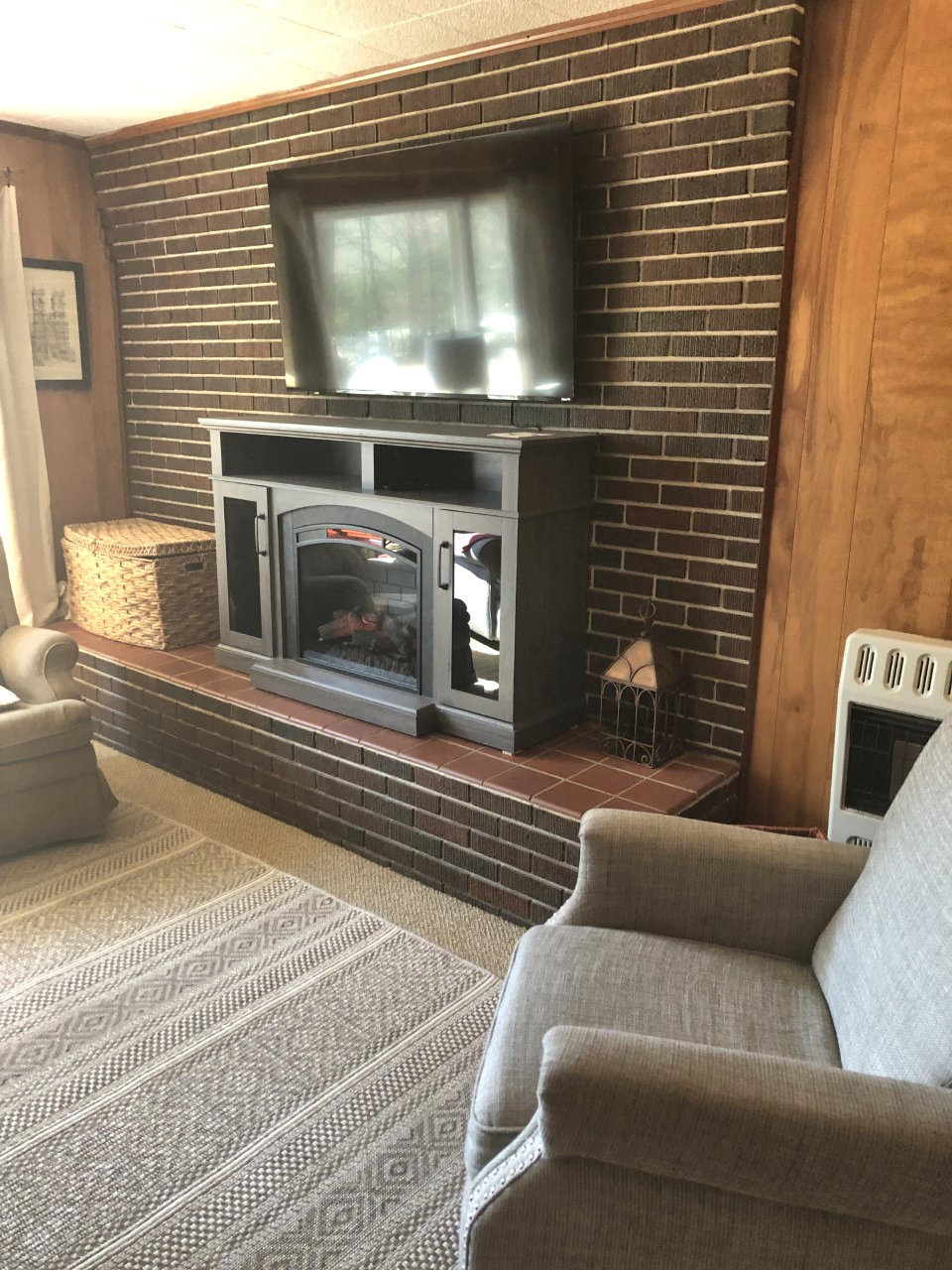 Reader Question: How Do I Handle My Wood Paneled Walls And Dark Brick Fireplace?