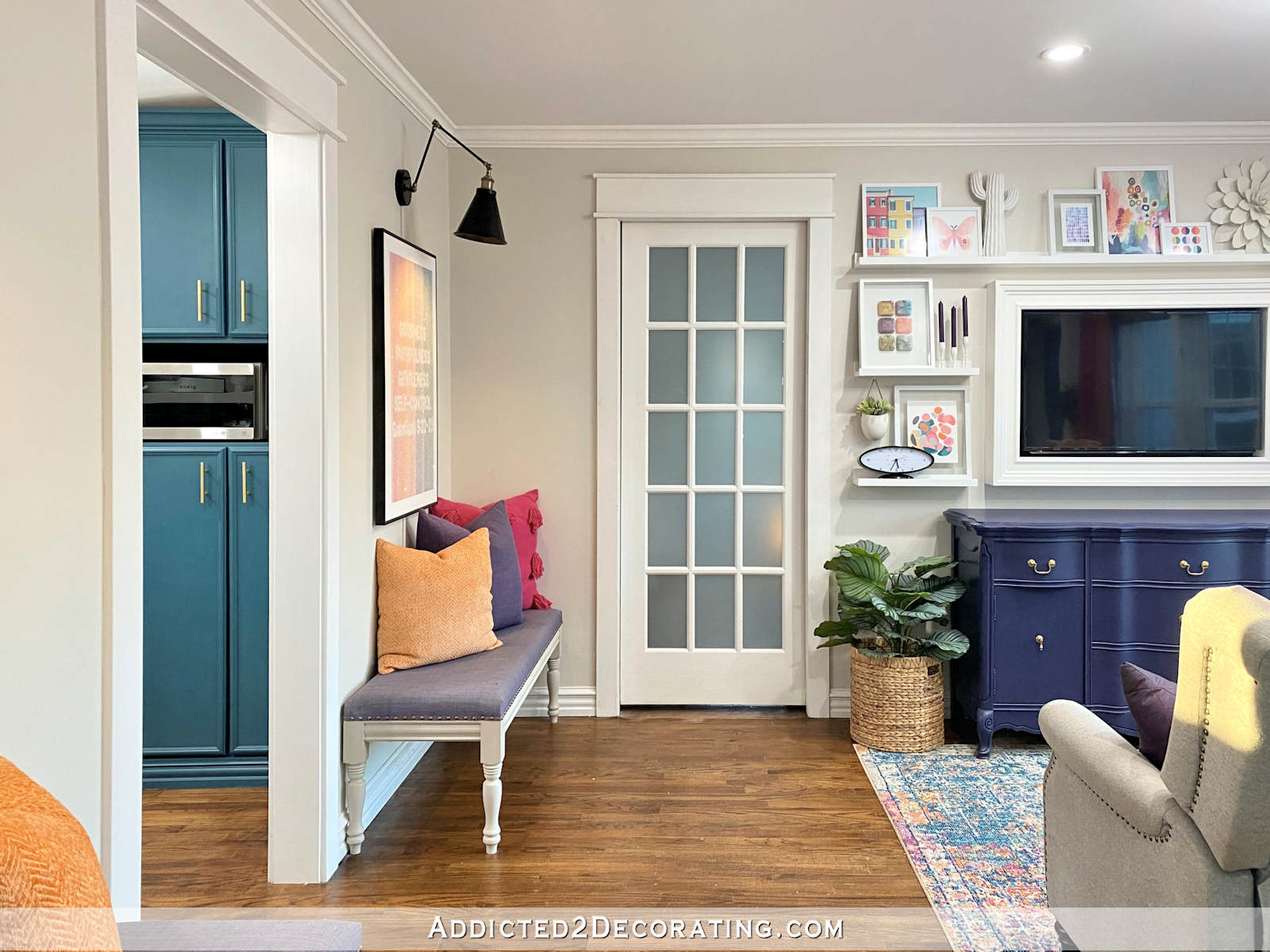White 15-lite interior pocket door leading from sitting room to studio