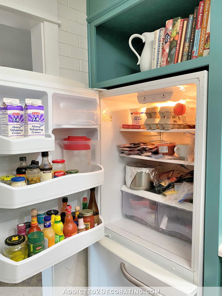 https://www.addicted2decorating.com/wp-content/uploads/2022/02/refrigerator-organization-before-1-900x1200.jpg