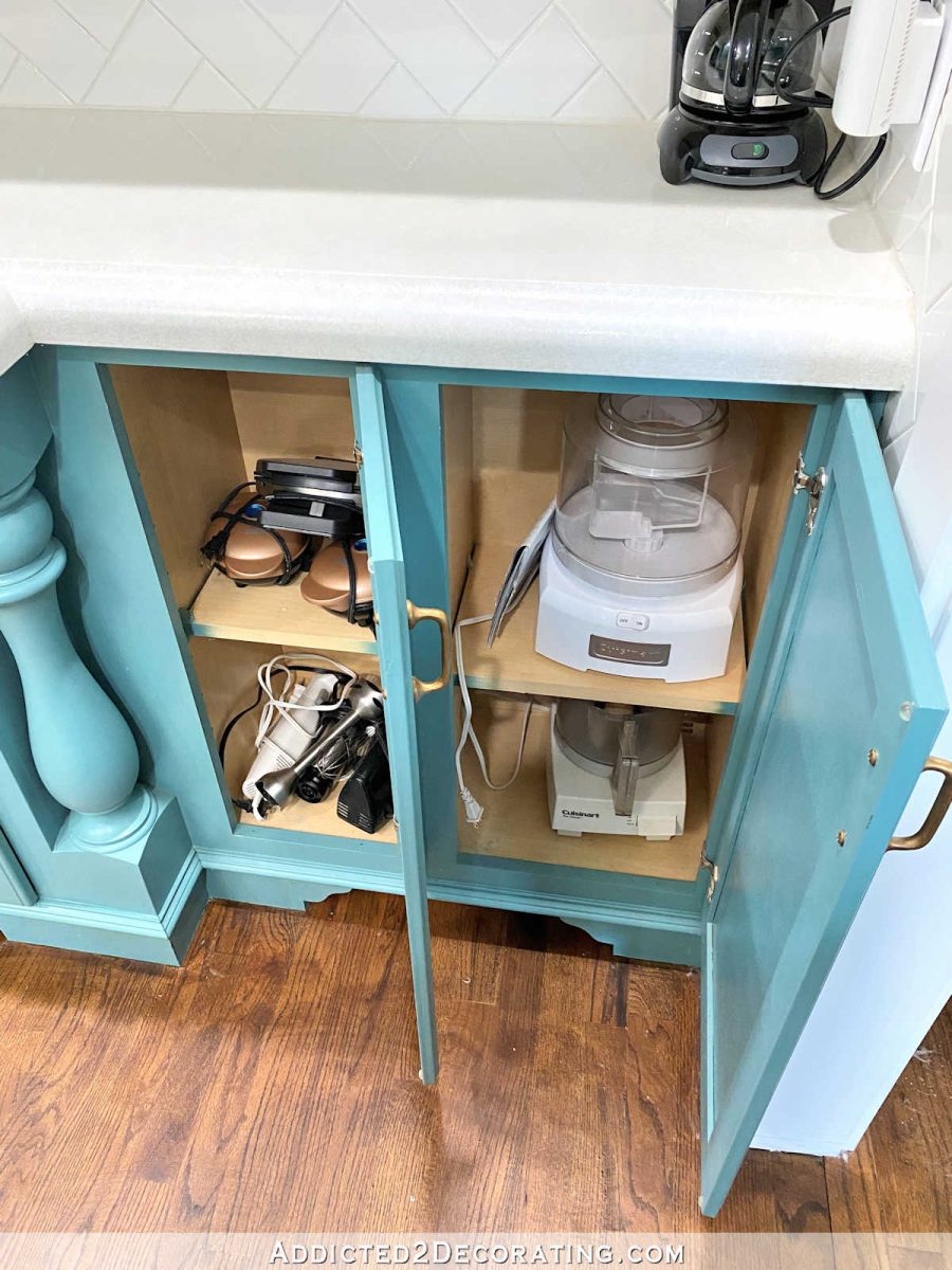 kitchen cabinets before organization - small appliances