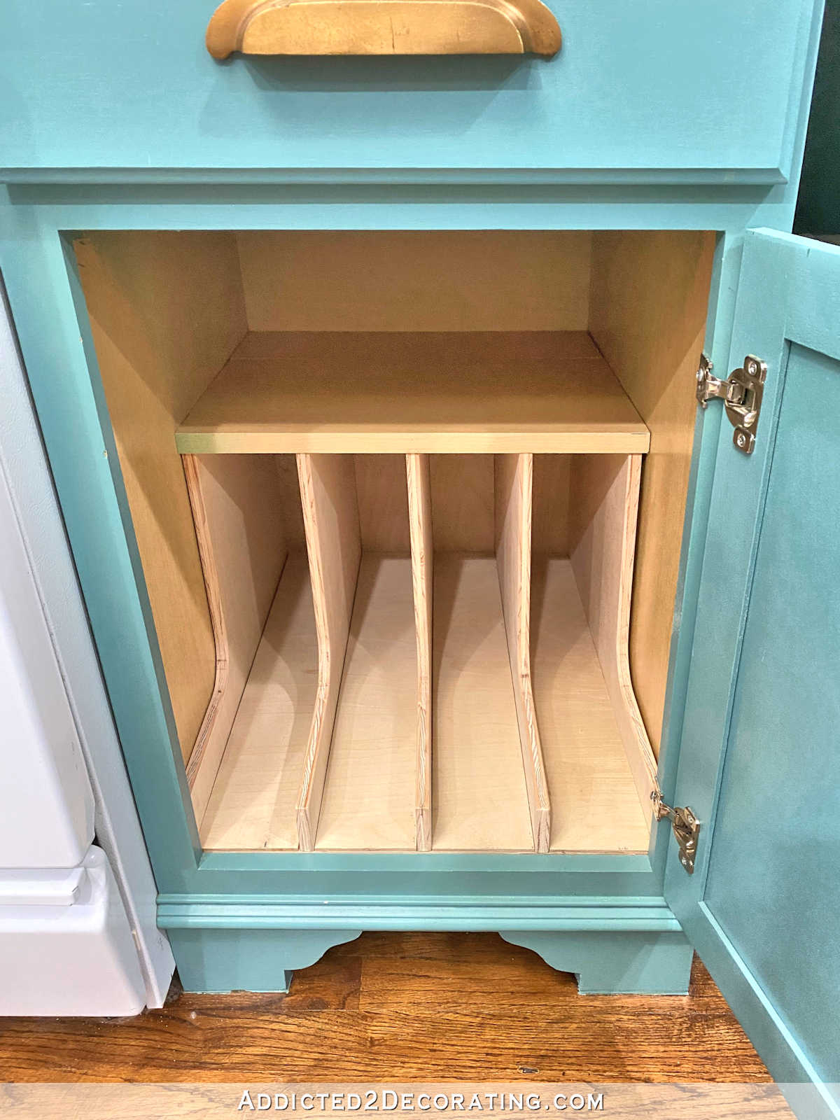 Assemble the DIY pan organizer using wood glue in the dadoes