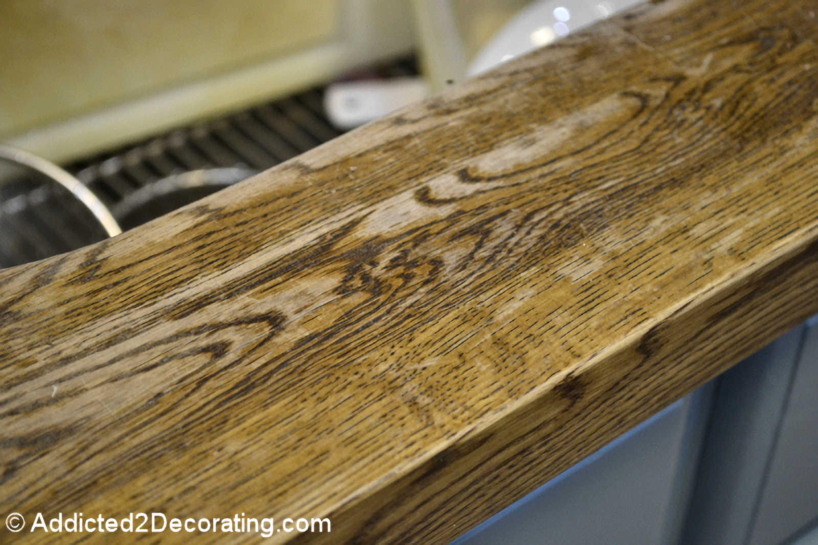 Finish wearing off of butcher block countertop around the sink