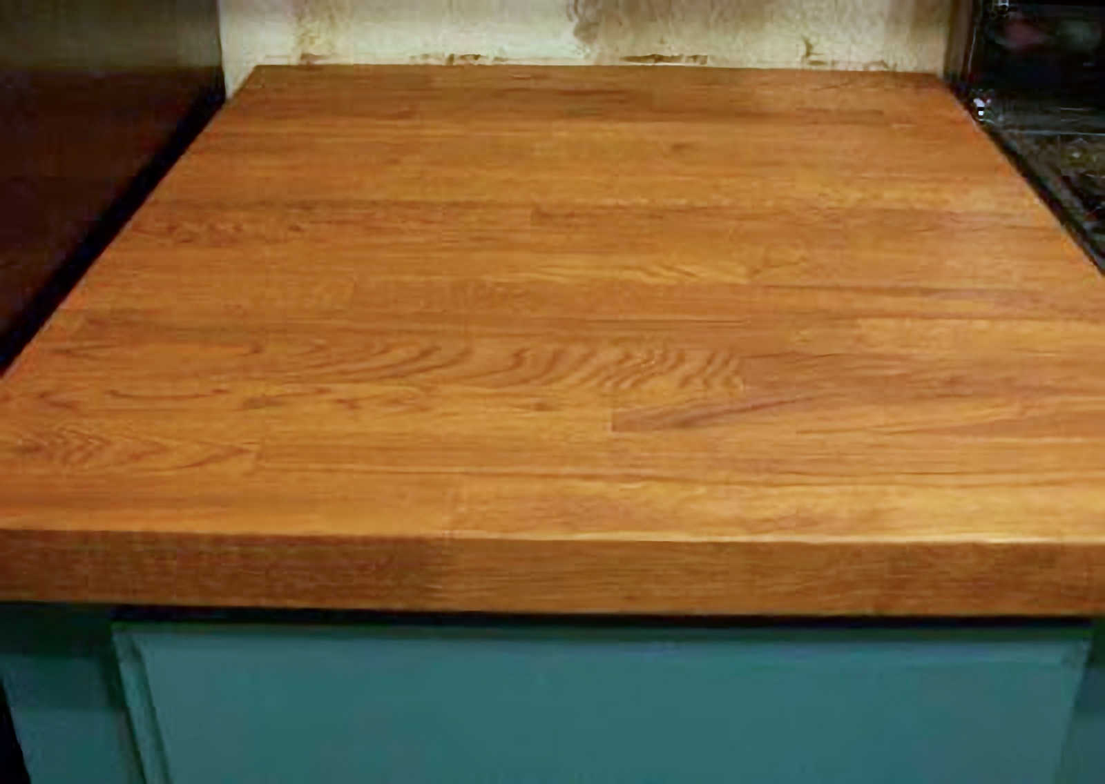 IKEA oak butcher block countertops with one coat of Minwax stain in English Chestnut