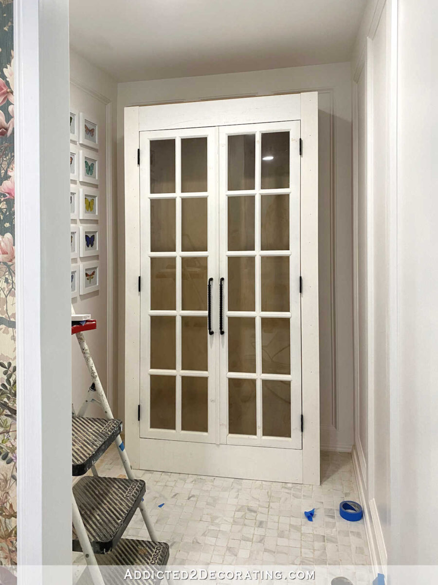 https://www.addicted2decorating.com/wp-content/uploads/2022/07/large-DIY-cabinet-with-glass-doors-25-900x1200.jpg