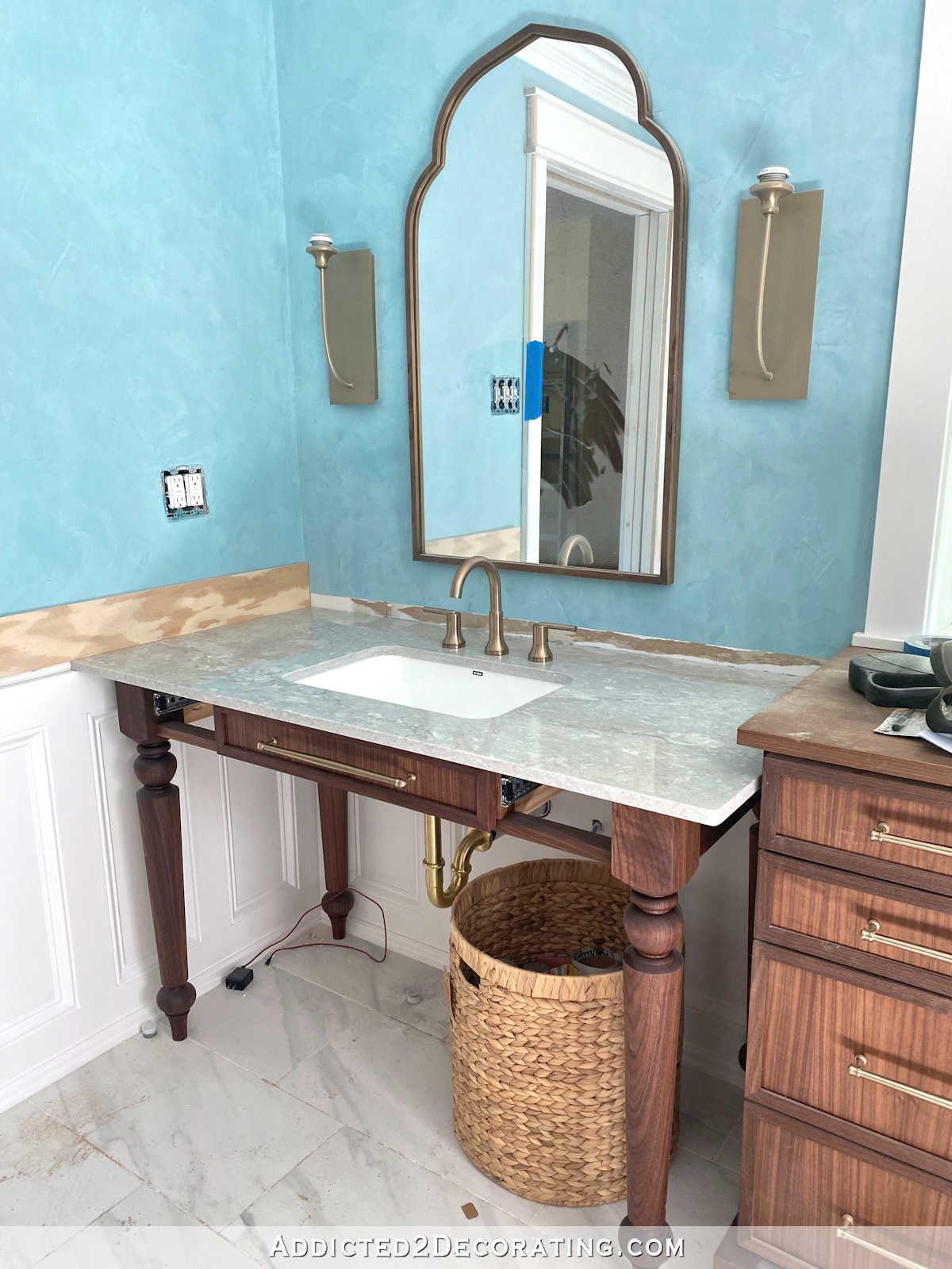 Vicostone Elysian quartz countertop in master bathroom on table-style walnut vanity