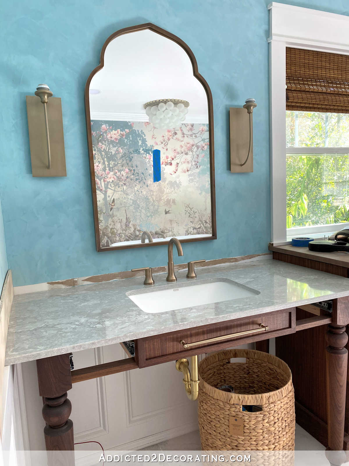 Vicostone Elysian light gray quartz countertop in master bathroom on table-style walnut vanity