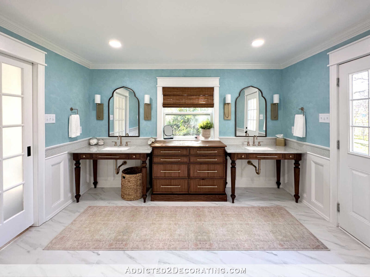 master bathroom remodel - walnut table style vanities, walnut storage dresser, light aqua blue Venetian plaster wall finish