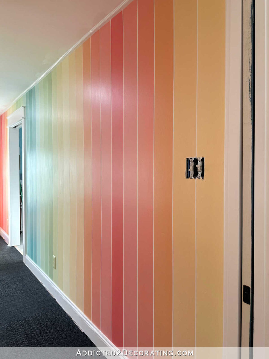 Colorful home gym walls - vertical stripes in rainbow colors