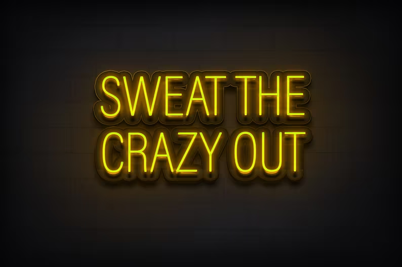 Sweat The Crazy Out yellow neon sign, to be used in our home gym