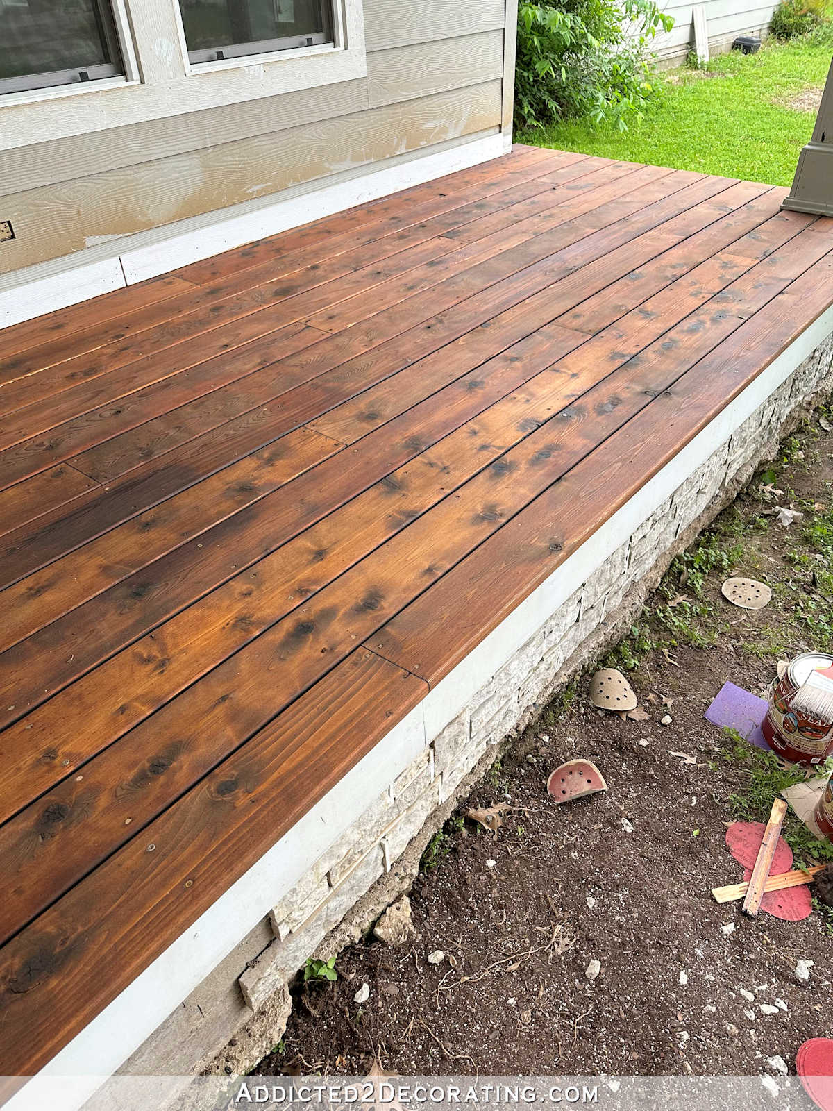 Ready Seal outdoor stain and sealer in Dark Walnut used on cedar wood front porch