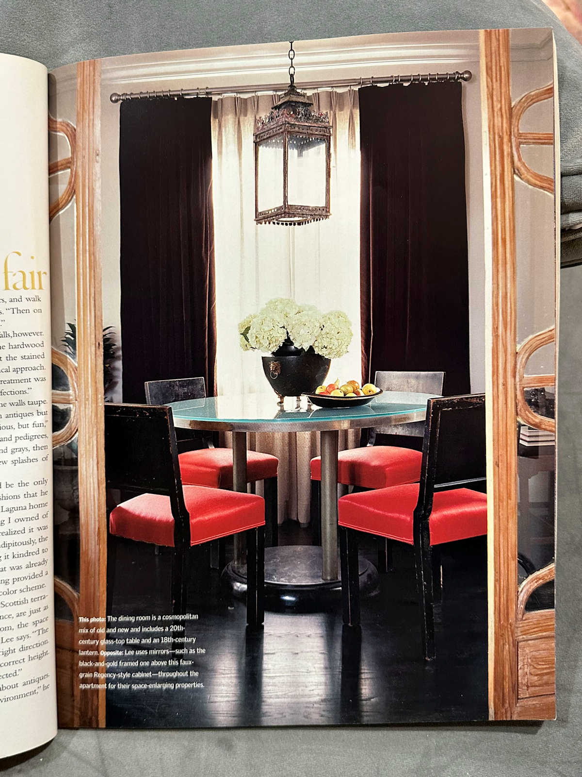 Dining room with heavy velvet draperies, metal and glass table, red dining chairs, from 2006. Is there such a thing as timeless dining room design?