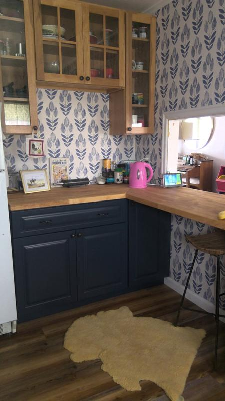 birch butcher block countertop with an oiled finish, from Home Depot, installed in a kitchen