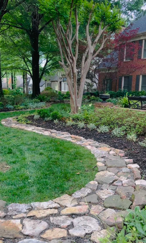 Field stone flower bed border from The Psychiatrist's Garden on Instagram