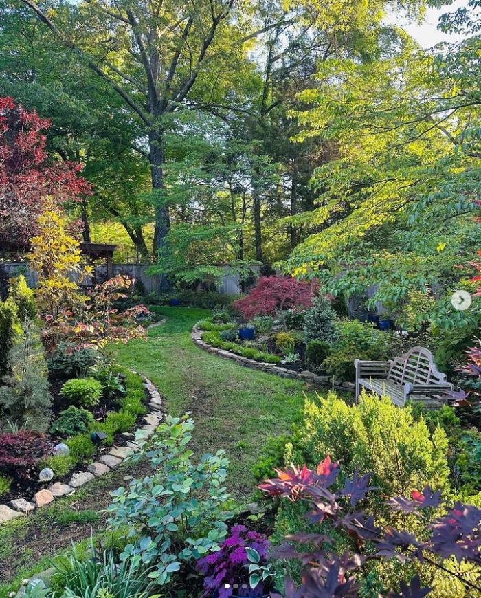 Natural stone border for flower bed from The Psychiatrist's Garden on Instagram