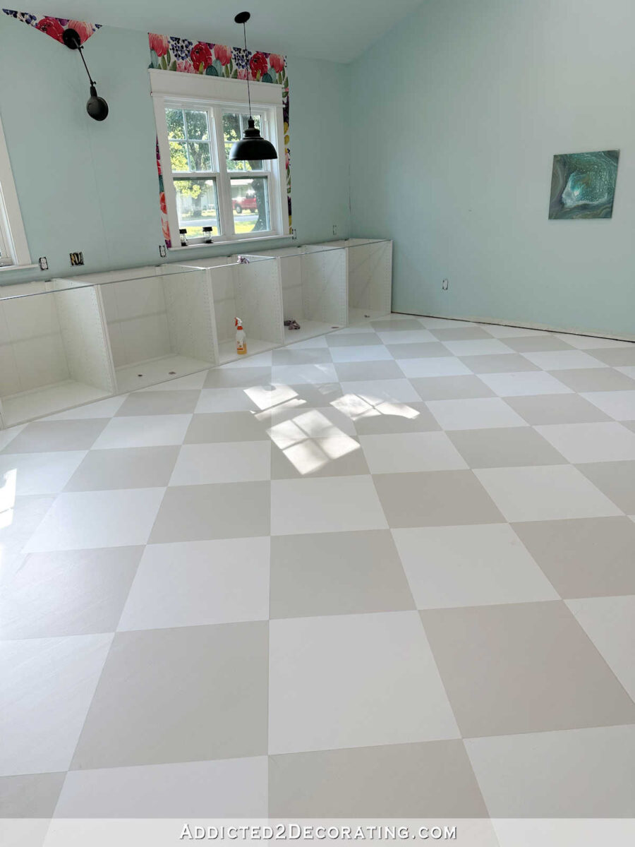 painted checkerboard floor design on hardwood