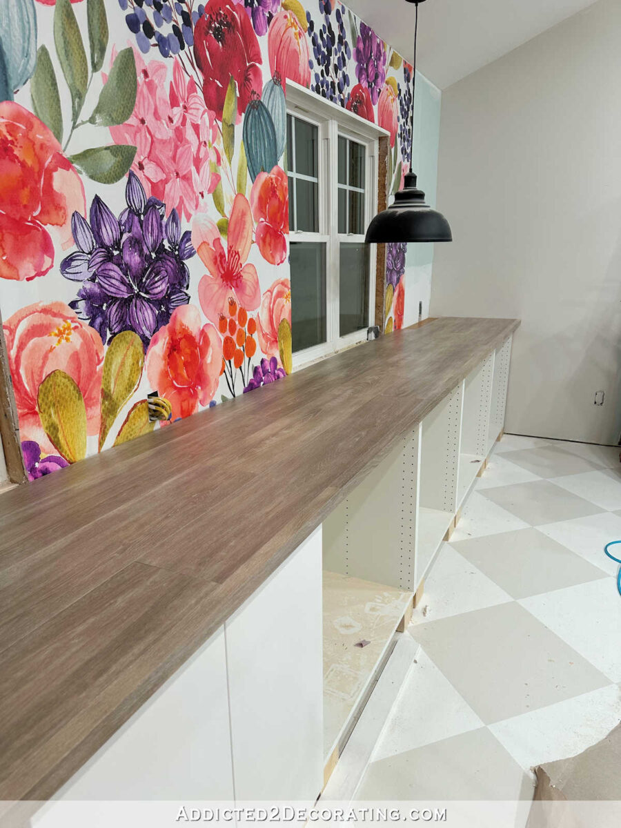 DIY 20-foot countertop made with laminate flooring boards