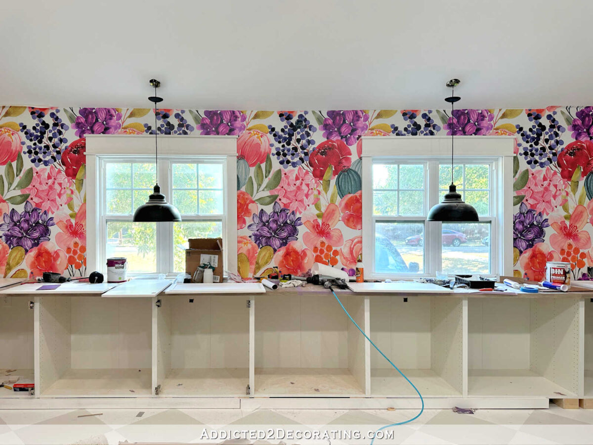 studio in progress -- large floral mural wall with IKEA Sektion cabinets