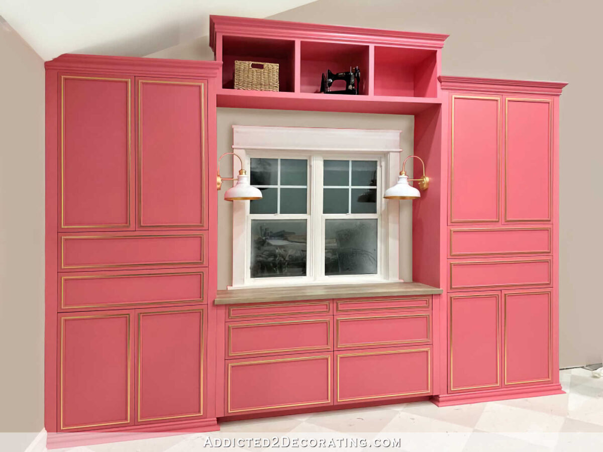 cabinets gray around window pink in cubbies