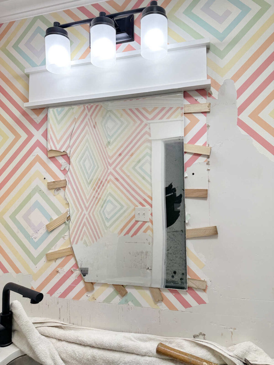 How to remove a bathroom mirror that's glued to the wall -- heat gun and shims
