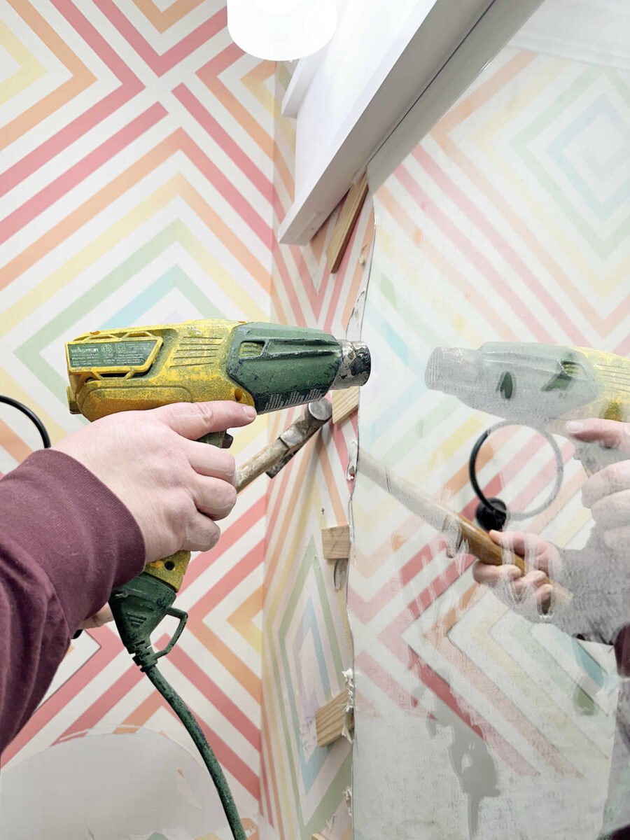 How to remove a bathroom mirror that's glued to the wall. 